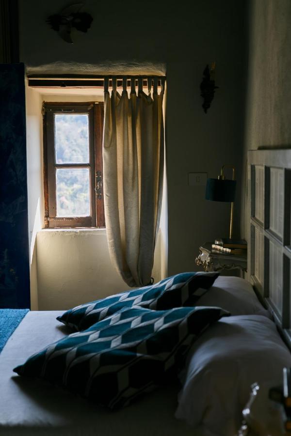 Opera Suites - Le Notti Bianche Calcata Bagian luar foto